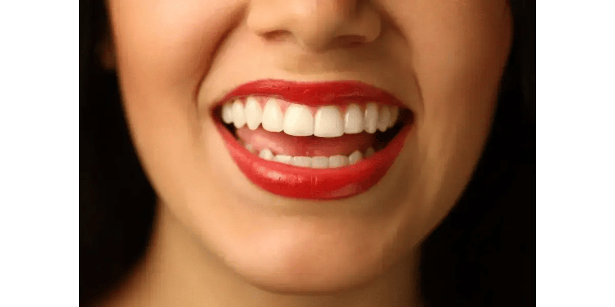 Female vocalist demonstrating proper open mouth posture and technique to increase singing voice volume.