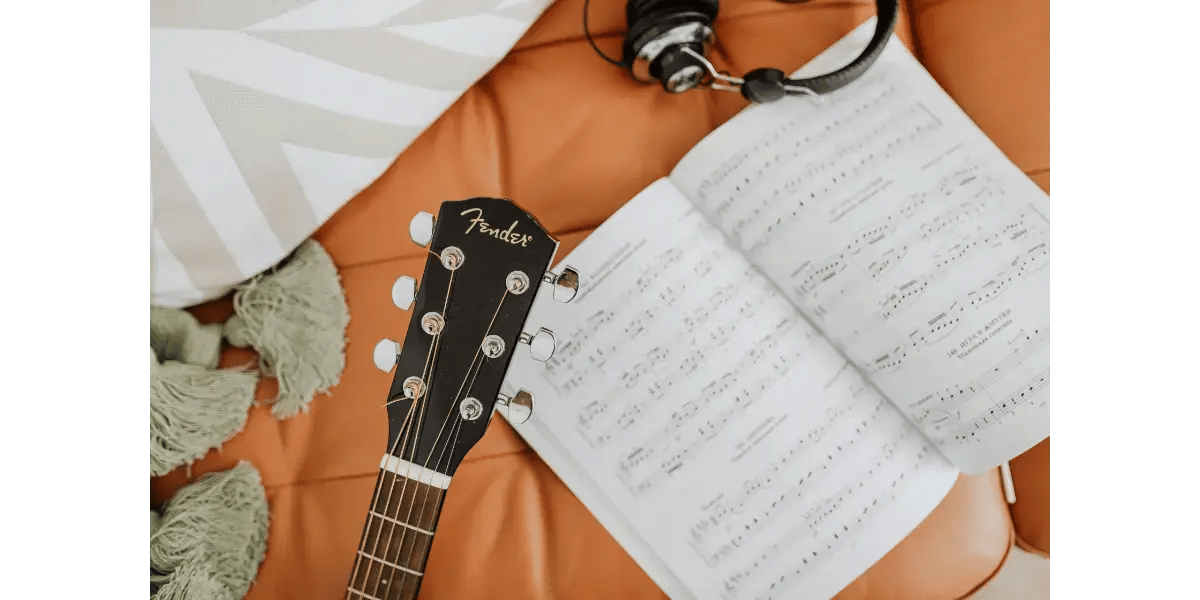Student reviewing music notes during weekly live group singing lessons