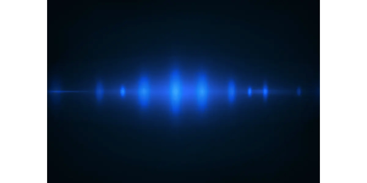 Here are a few options for the alt text for the featured image showing the blue glowing sound wave:  Option 1 (Best balance of Description & SEO): "A smooth, glowing blue audio waveform on a dark background, representing a clear and polished vocal tone.