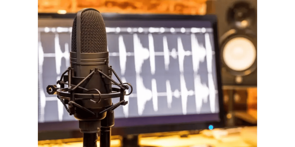 A studio microphone and soundwave representing voice training and expanding vocal range.
