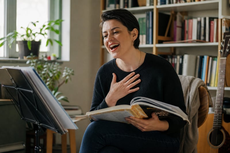 Singer in Cozy Living Room with Sheet Music