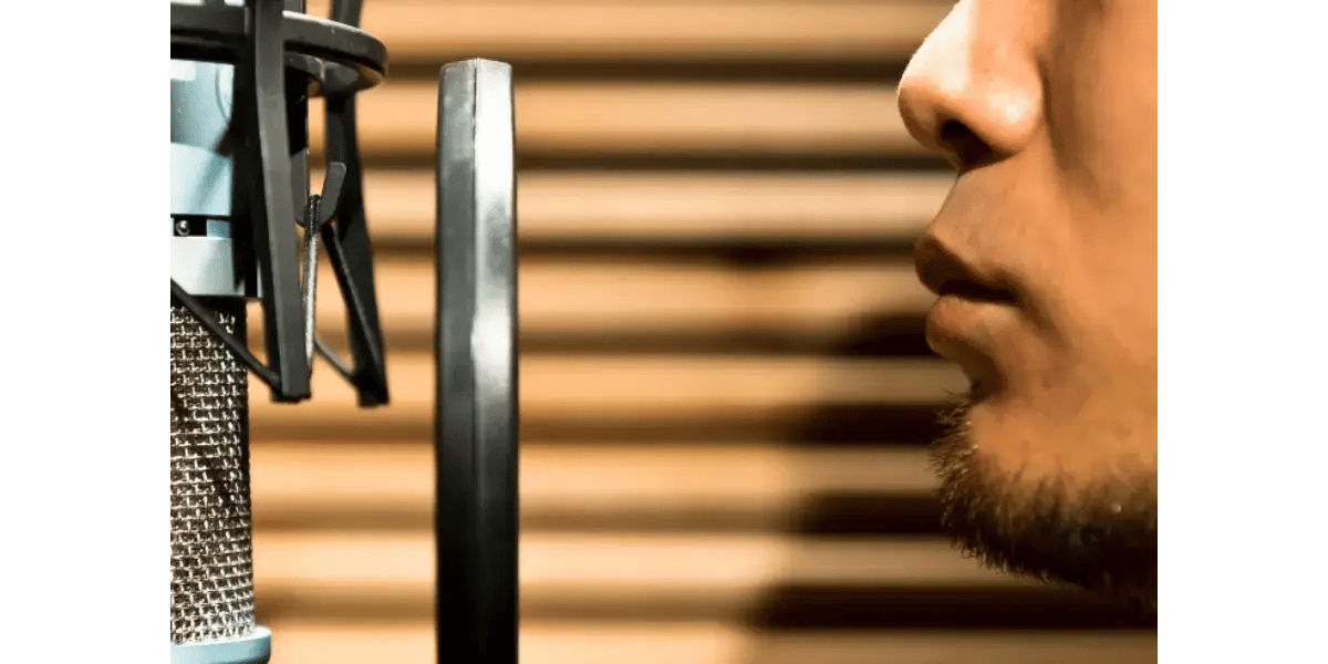 Vocal student practicing breath control and proper larynx position exercises for a better singing voice.