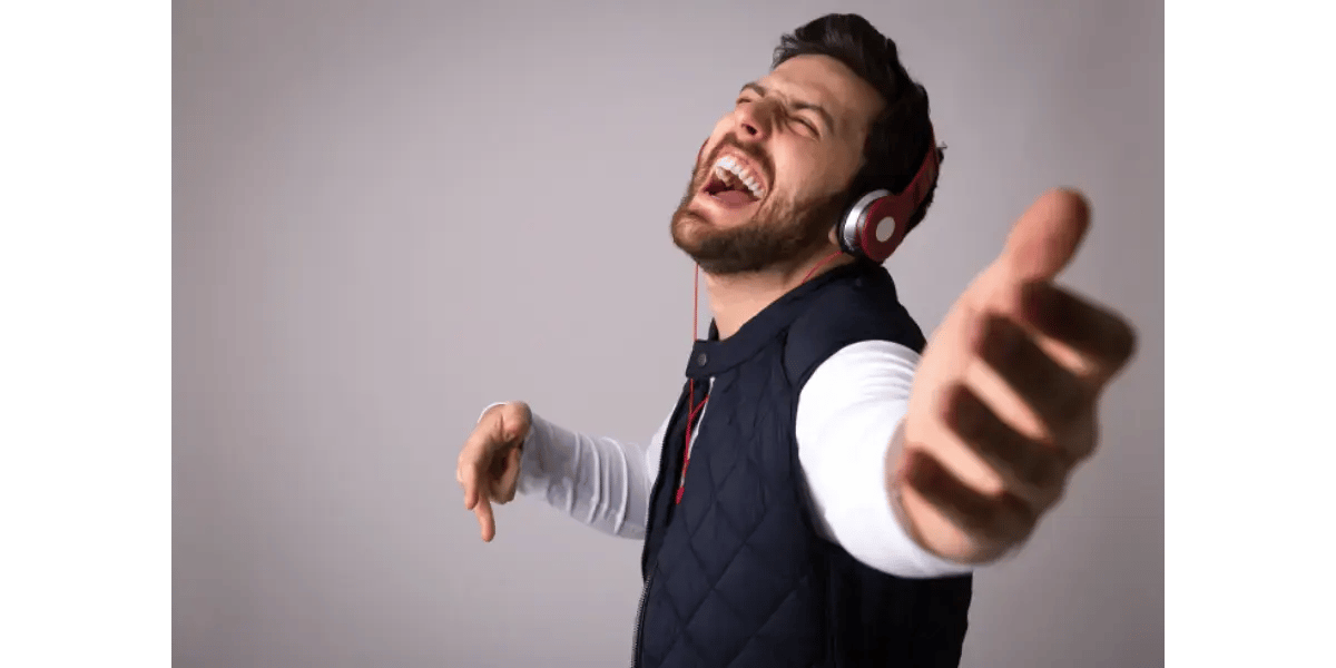A singer demonstrating the physical tension and choking sensation often caused by an improperly high laryngeal position.