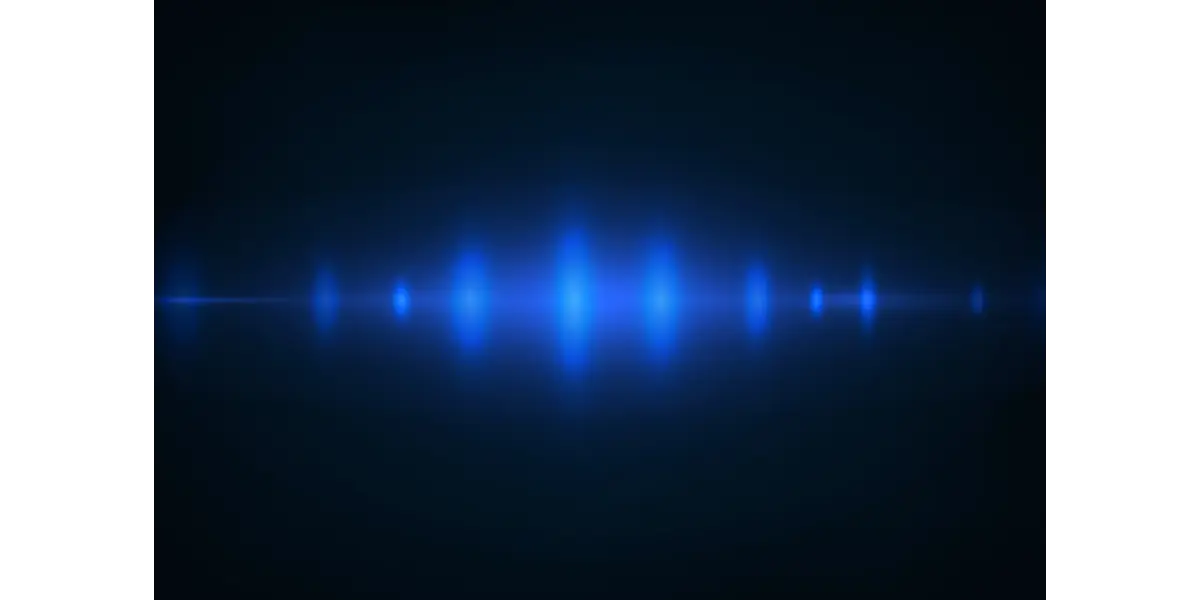 Here are a few options for the alt text for the featured image showing the blue glowing sound wave:  Option 1 (Best balance of Description & SEO): "A smooth, glowing blue audio waveform on a dark background, representing a clear and polished vocal tone.